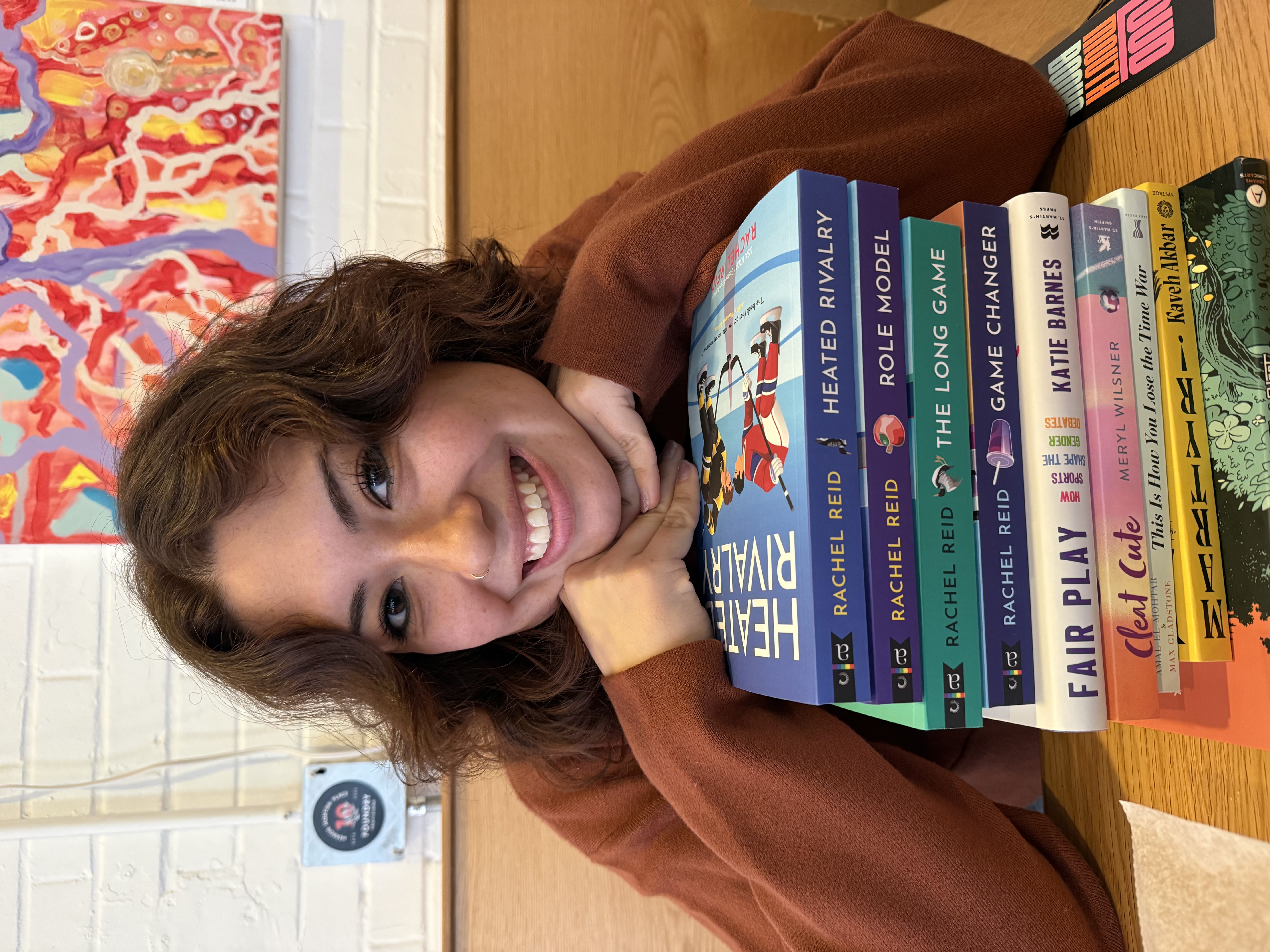 Andrea with her Heated Rivarly Books (she already ready read them, they're just trophy books)